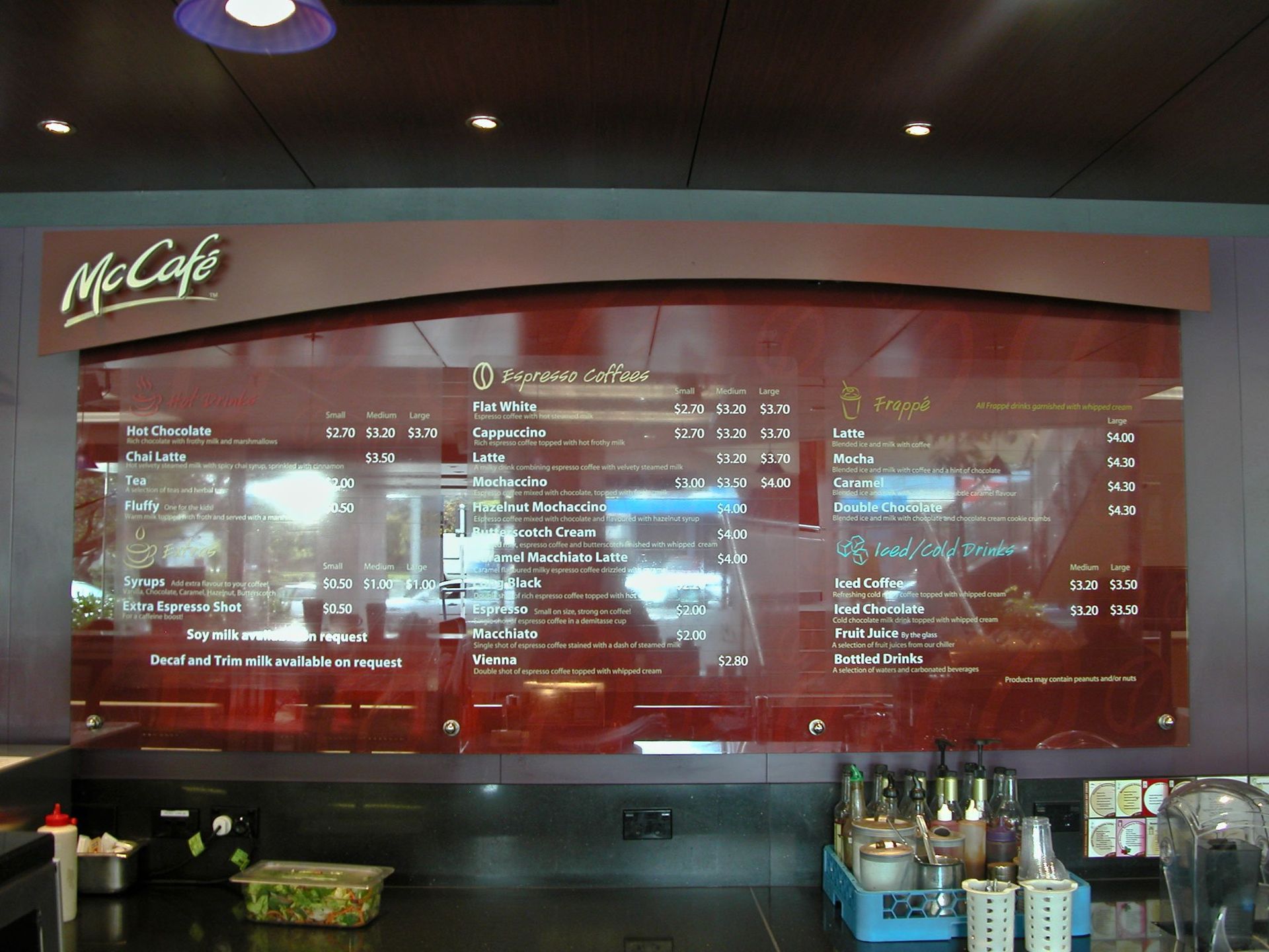 Computer cut vinyl lettering applied to face of glass