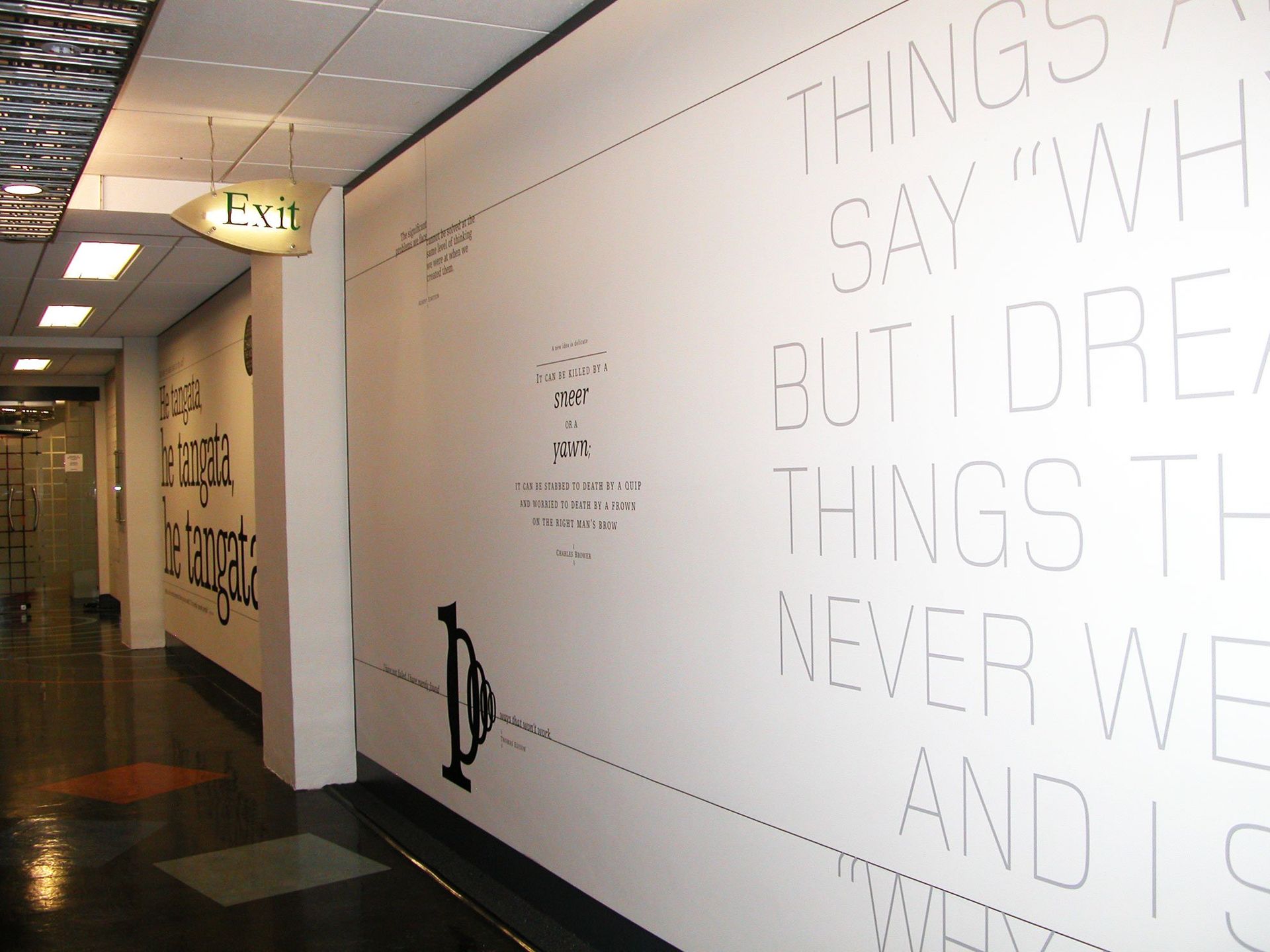 Computer cut vinyl graphics applied to meeting room wall