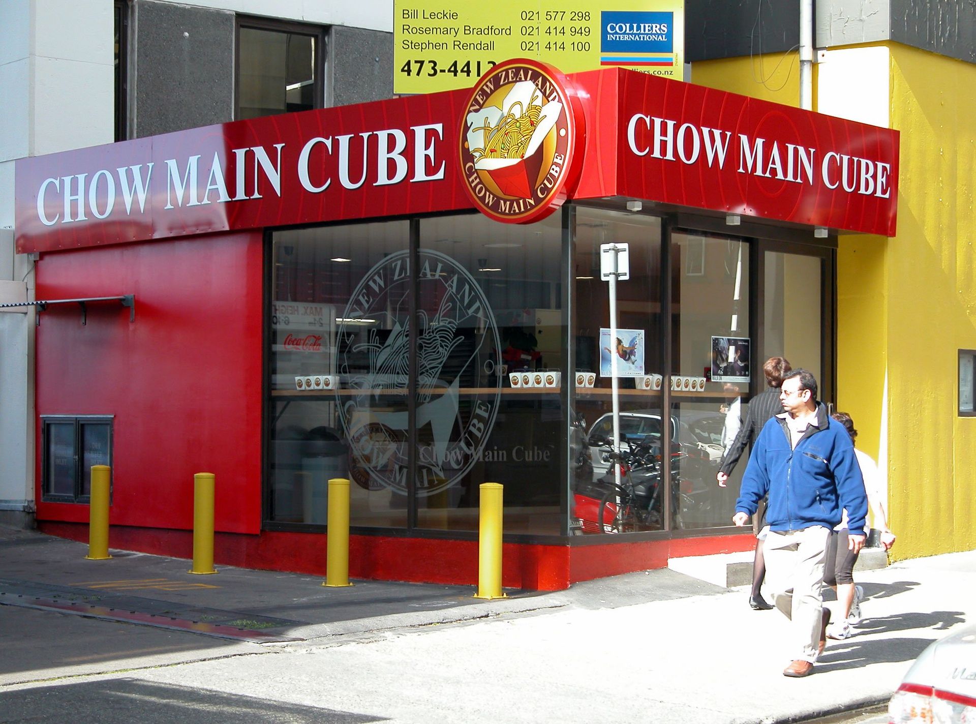 Fascia signage with circular light box and window etch