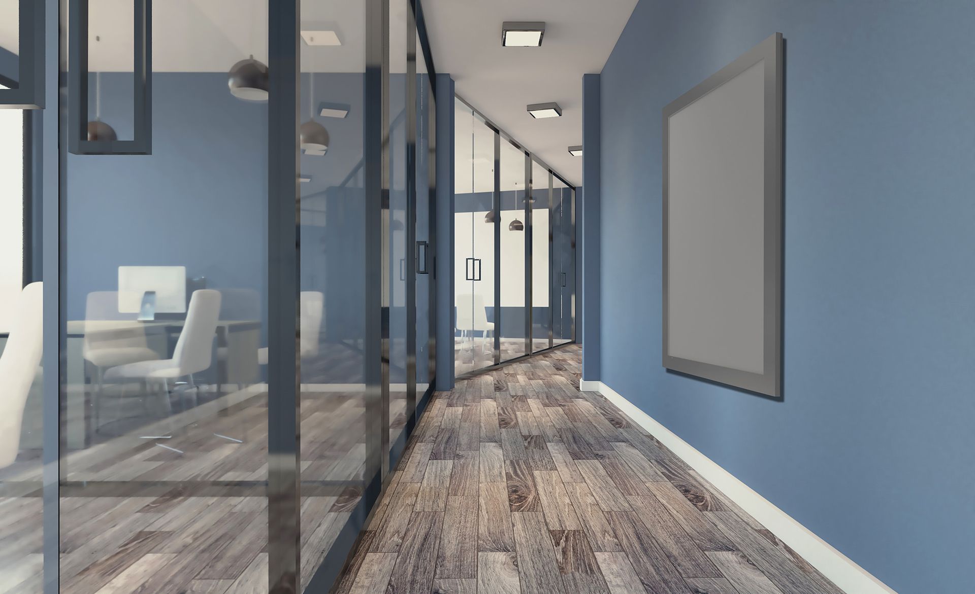 A long hallway in an office building with blue walls and wooden floors.