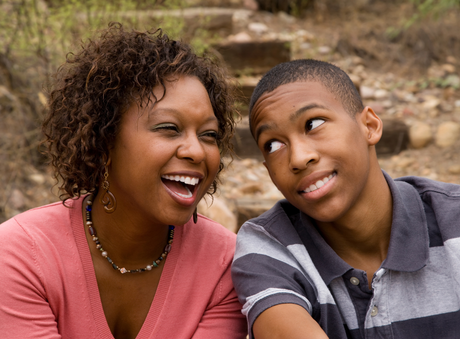 happy parent and happy teenager