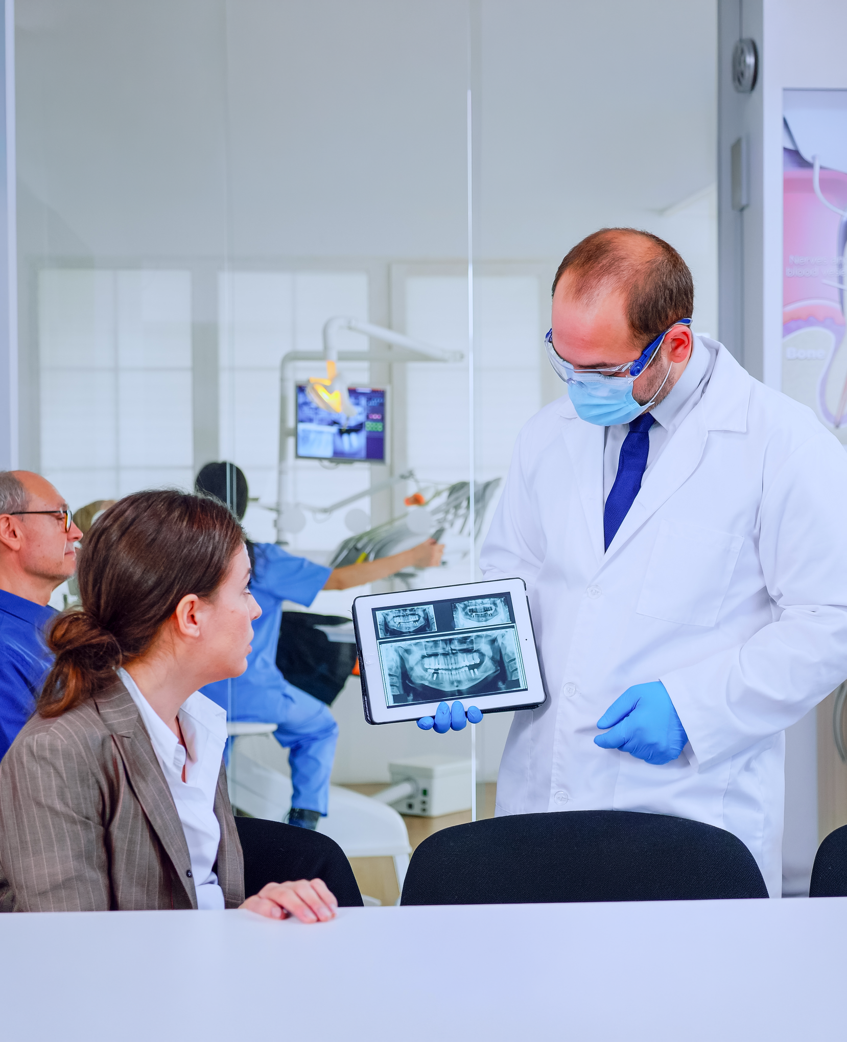 A woman is laying on a bed with a hair net on her head