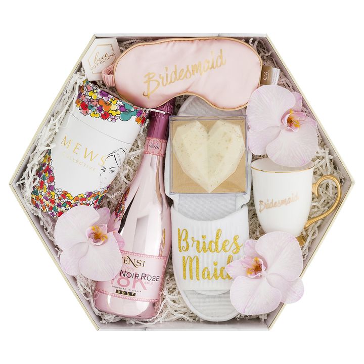 White box with pink items for bridesmaid