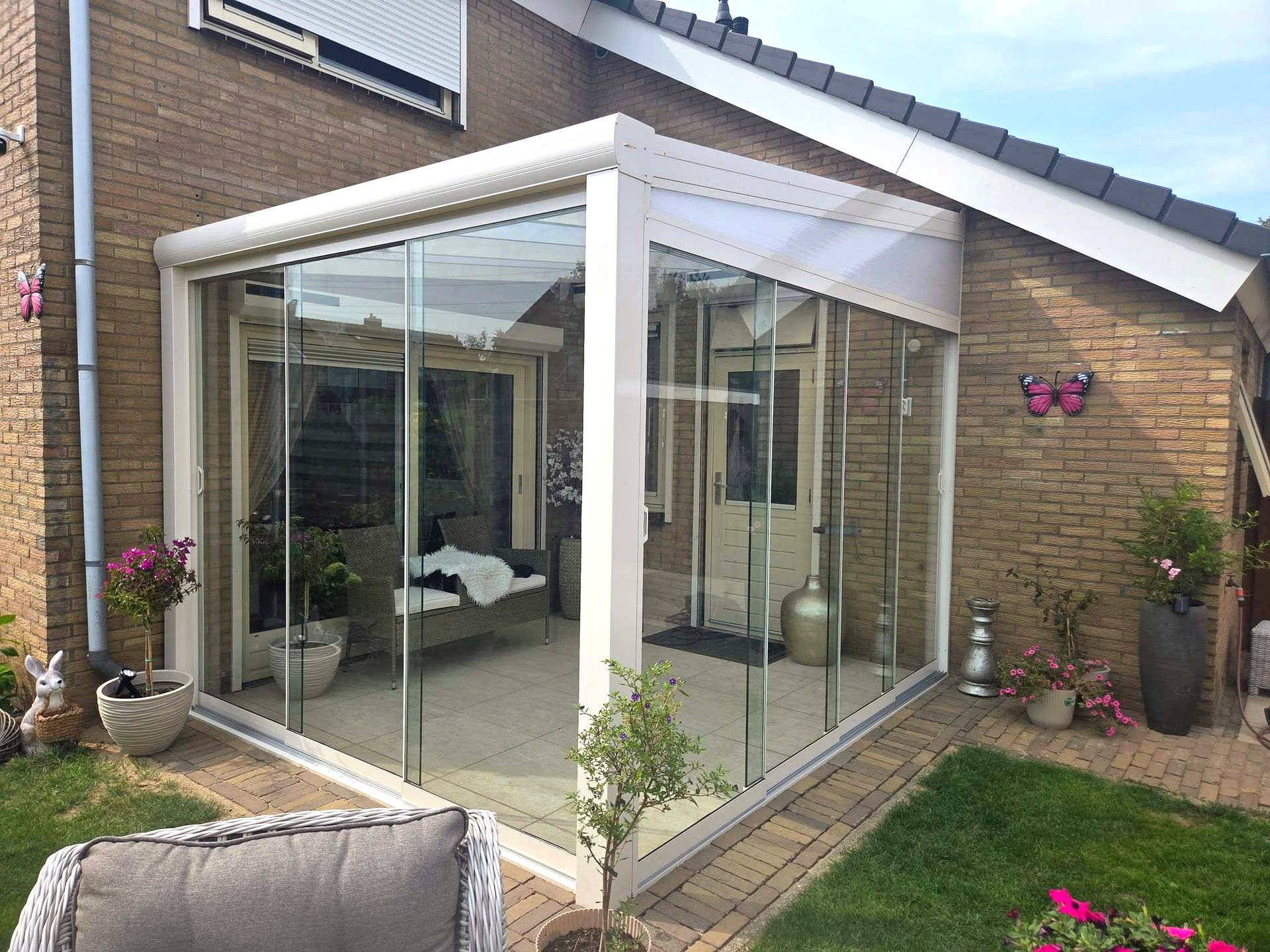 Tuinkamer in Bemmel met aluminium veranda en glazen schuifwanden – VerandaGo
Luxe aluminium veranda