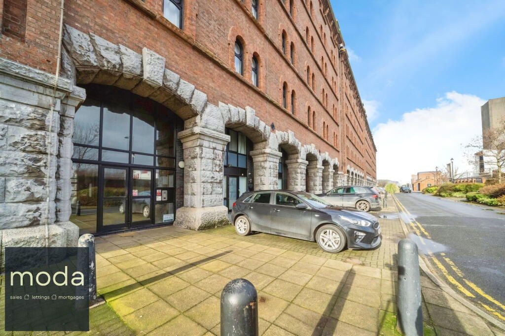 Brick building with arched entrance, 
