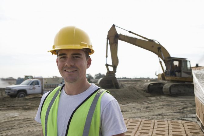 man in yellow hat smiling