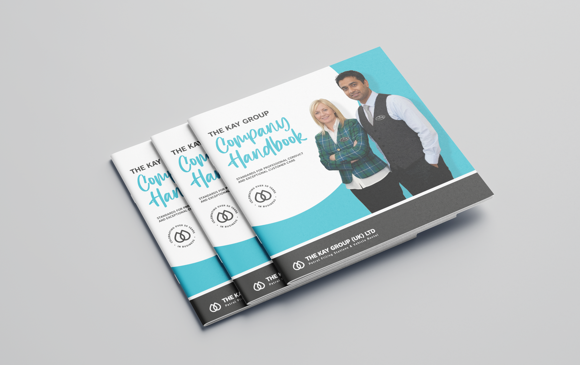 Stack of three teal-and-white business brochures with a smiling man and woman on the cover.