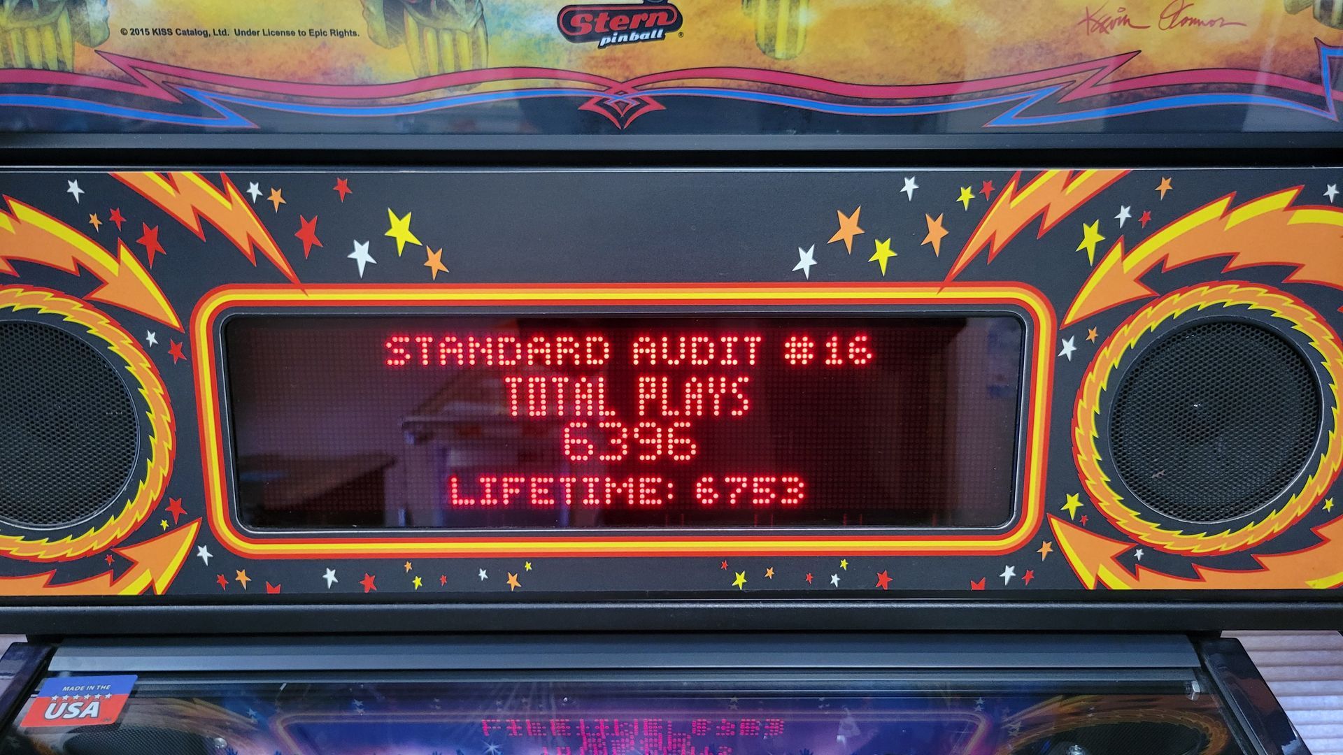 A pinball machine with a screen that says standard audit # 16 total plays 6396 lifetime 6753