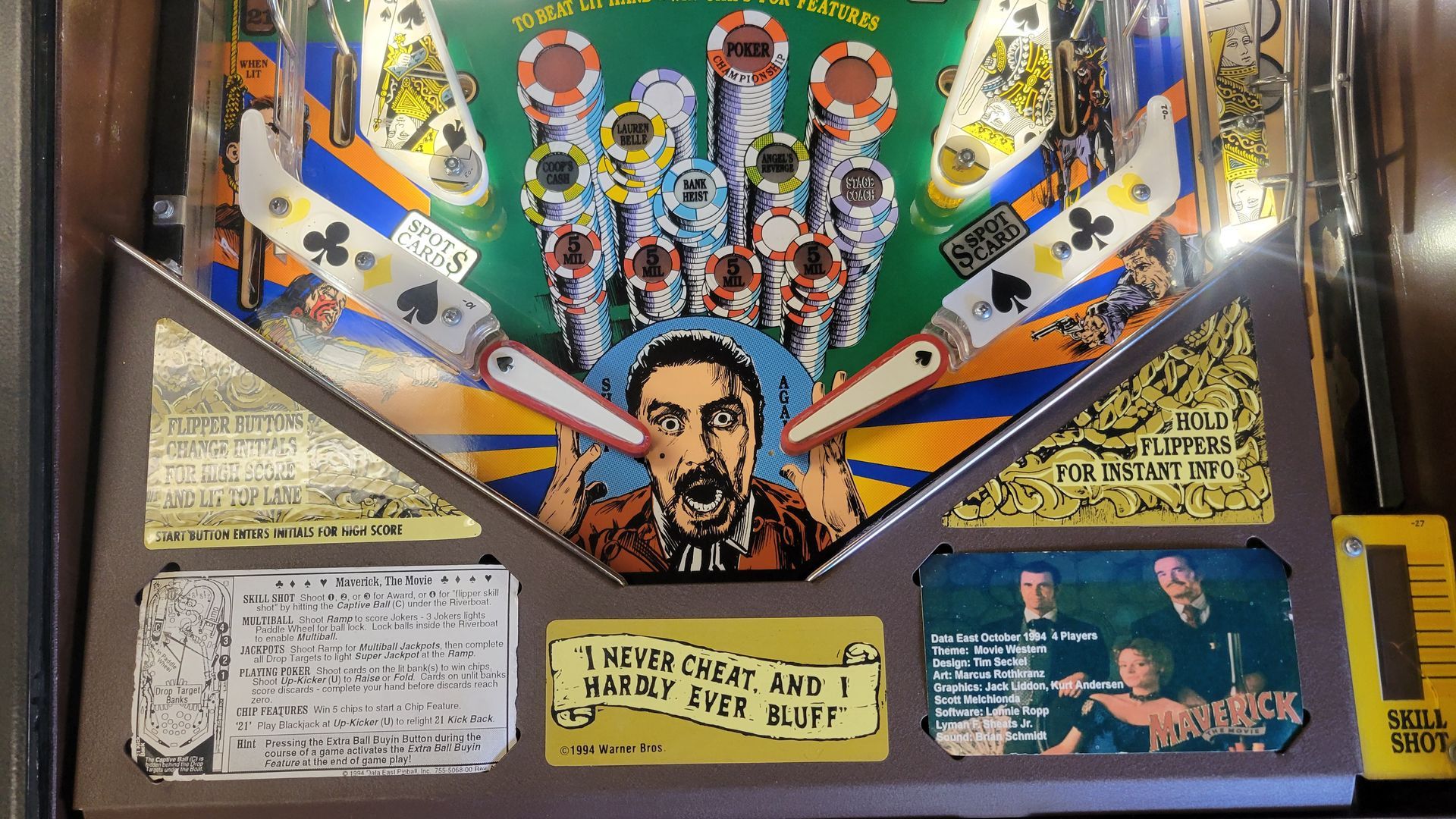 A pinball machine with a picture of a man on it