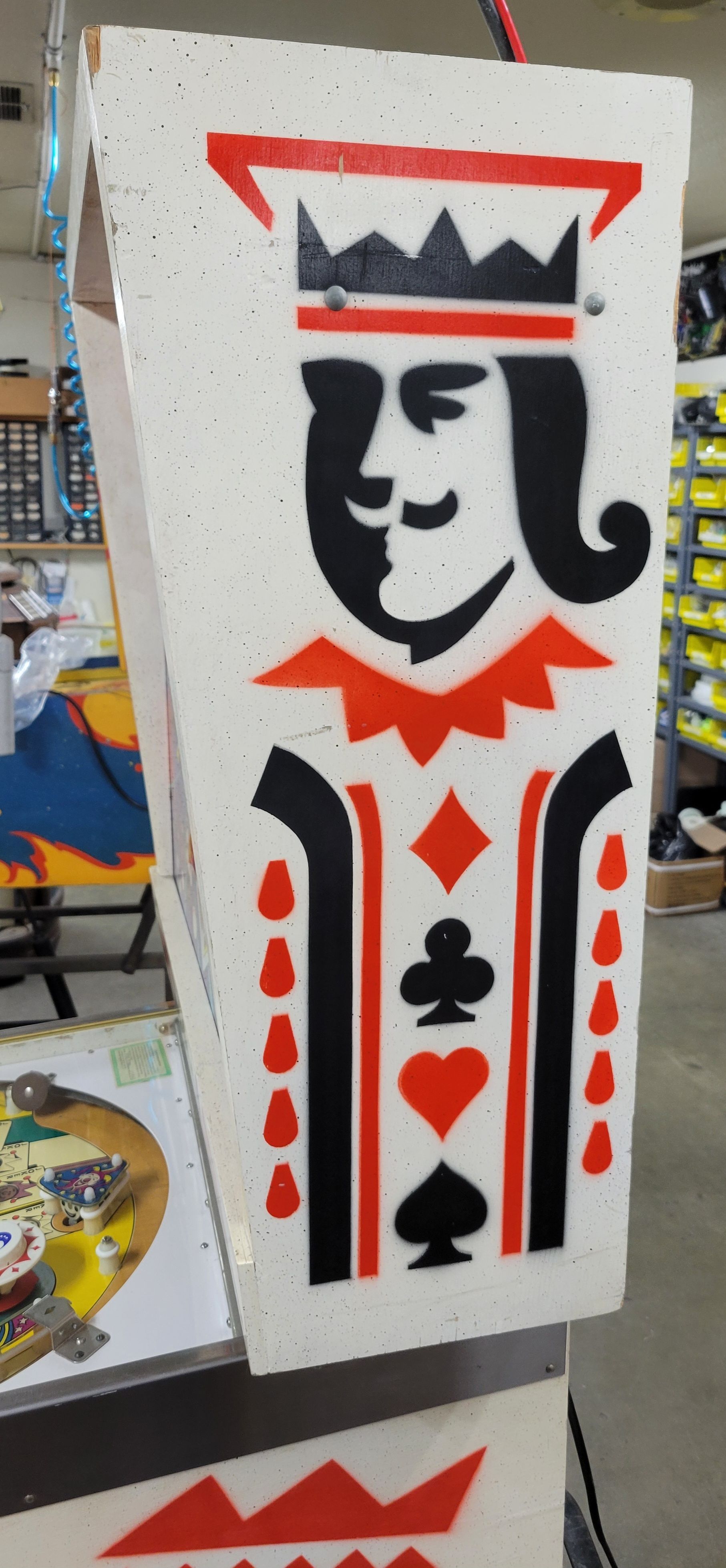 A king card with a crown and spades on it