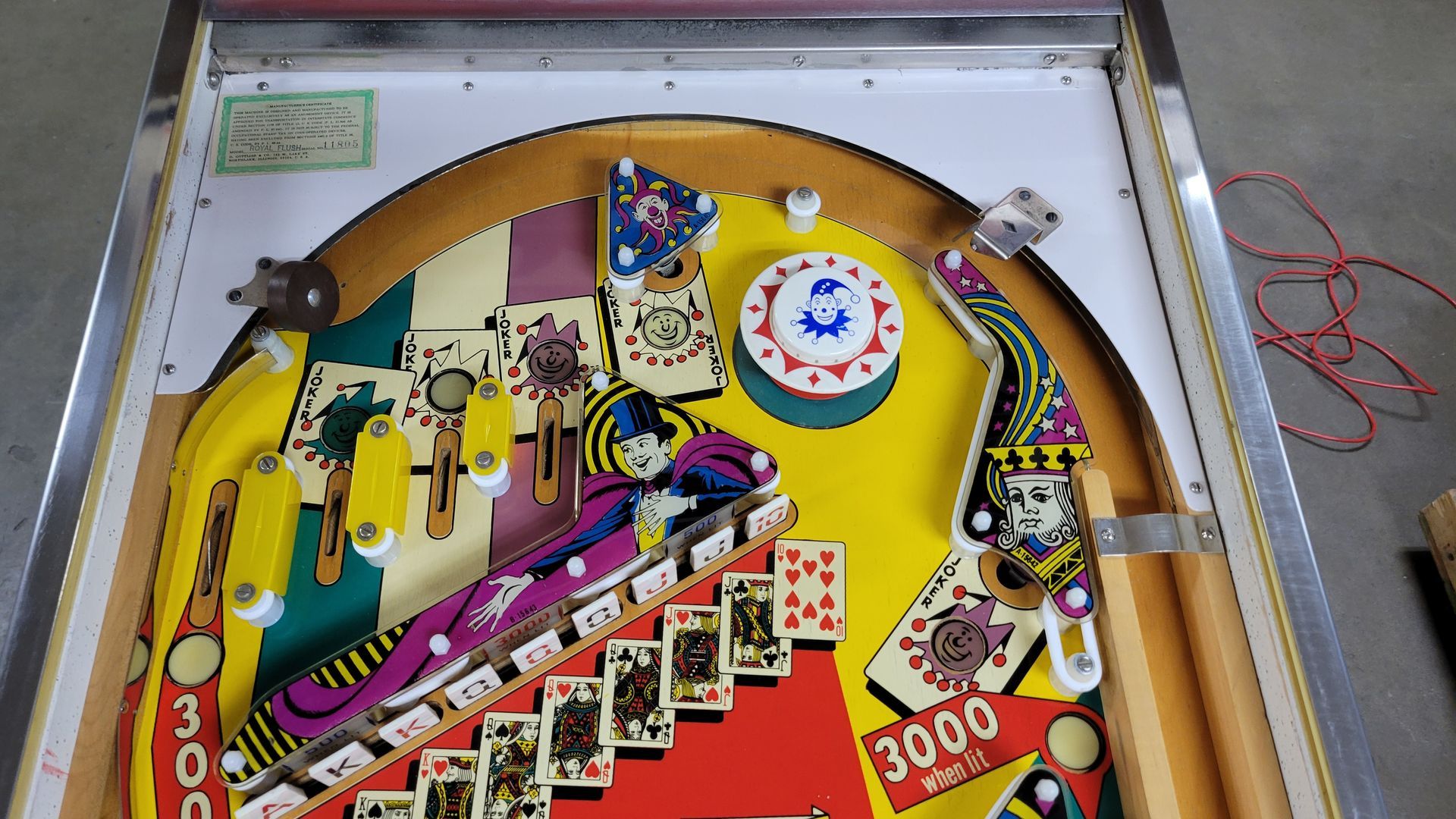 A pinball machine with the number 3000 on it