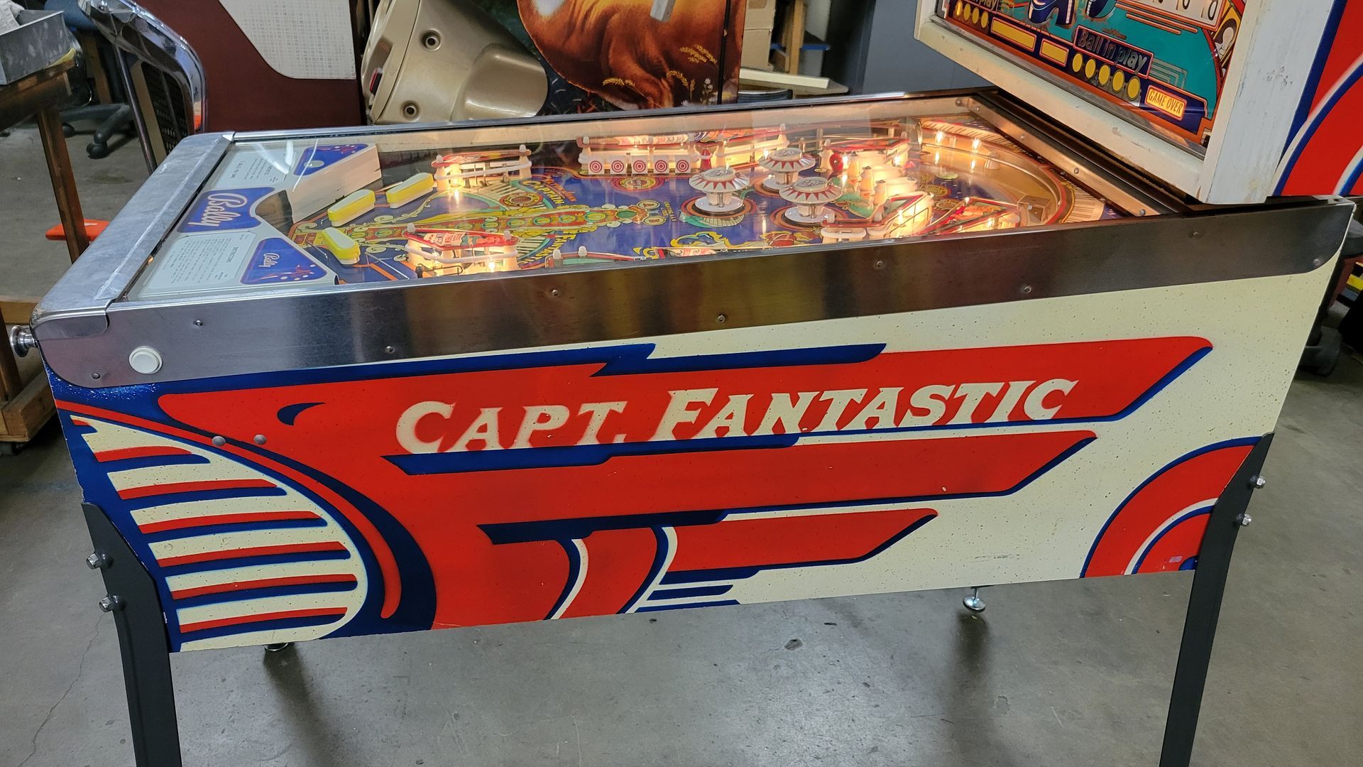 A pinball machine that says capt fantastic on it