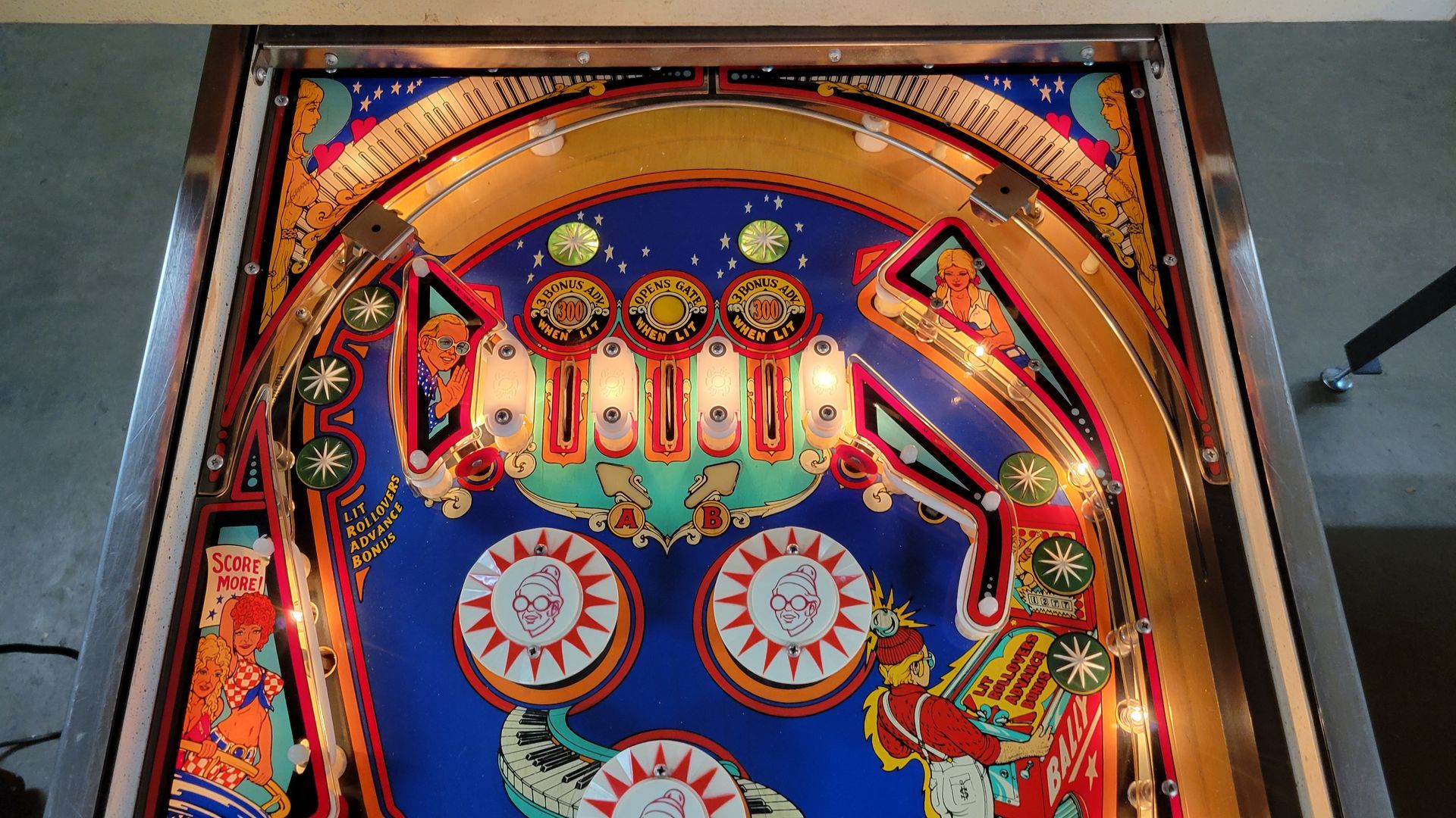 A pinball machine with the word laughing on it