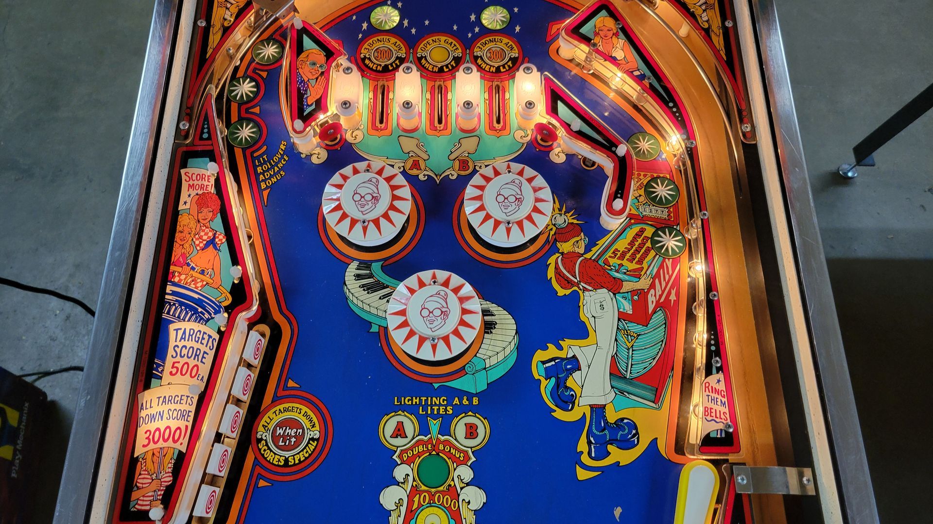 A pinball machine with the word caligula on it