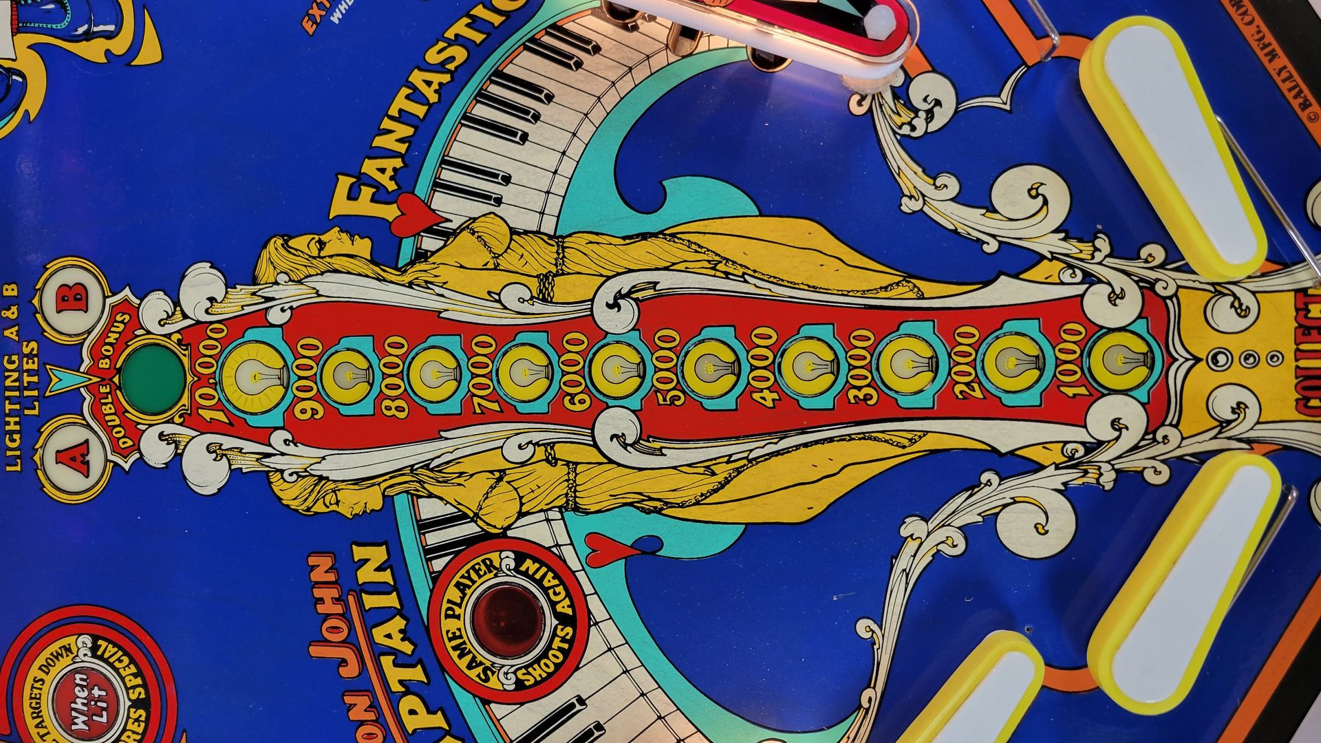A pinball machine that says fantastic captain john on it