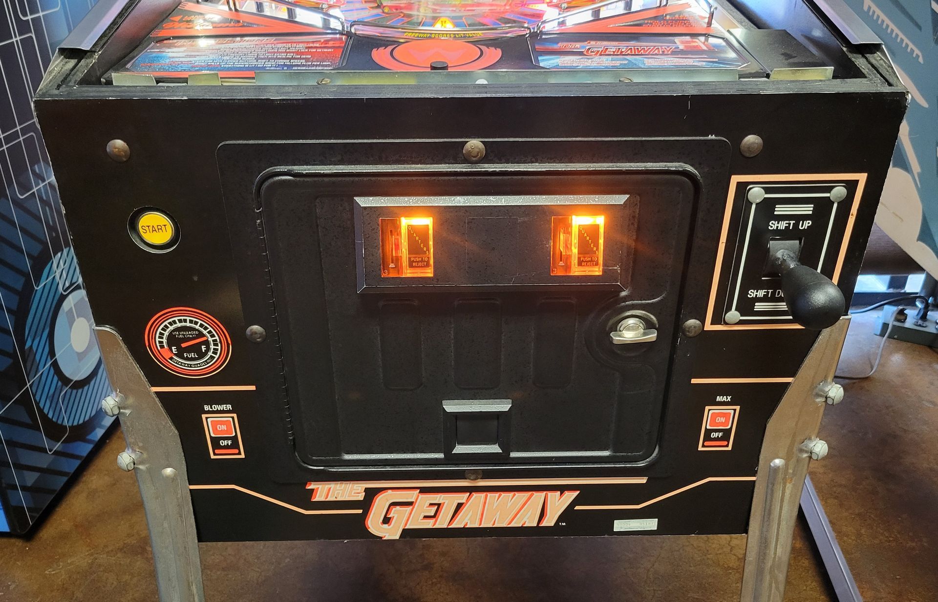 A pinball machine with the word getaway on it