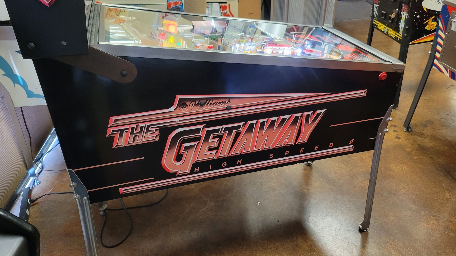 A pinball machine with the word getaway on it