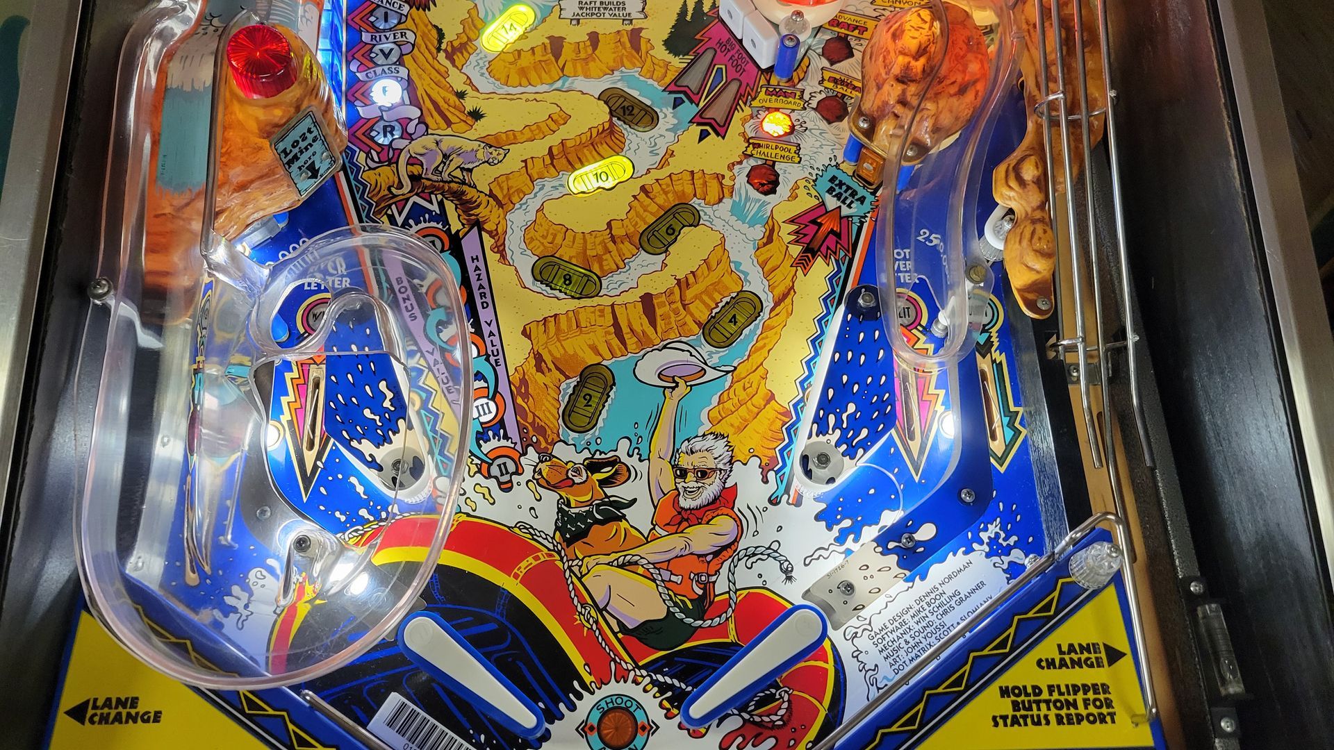 A pinball machine with a picture of a cartoon character on it