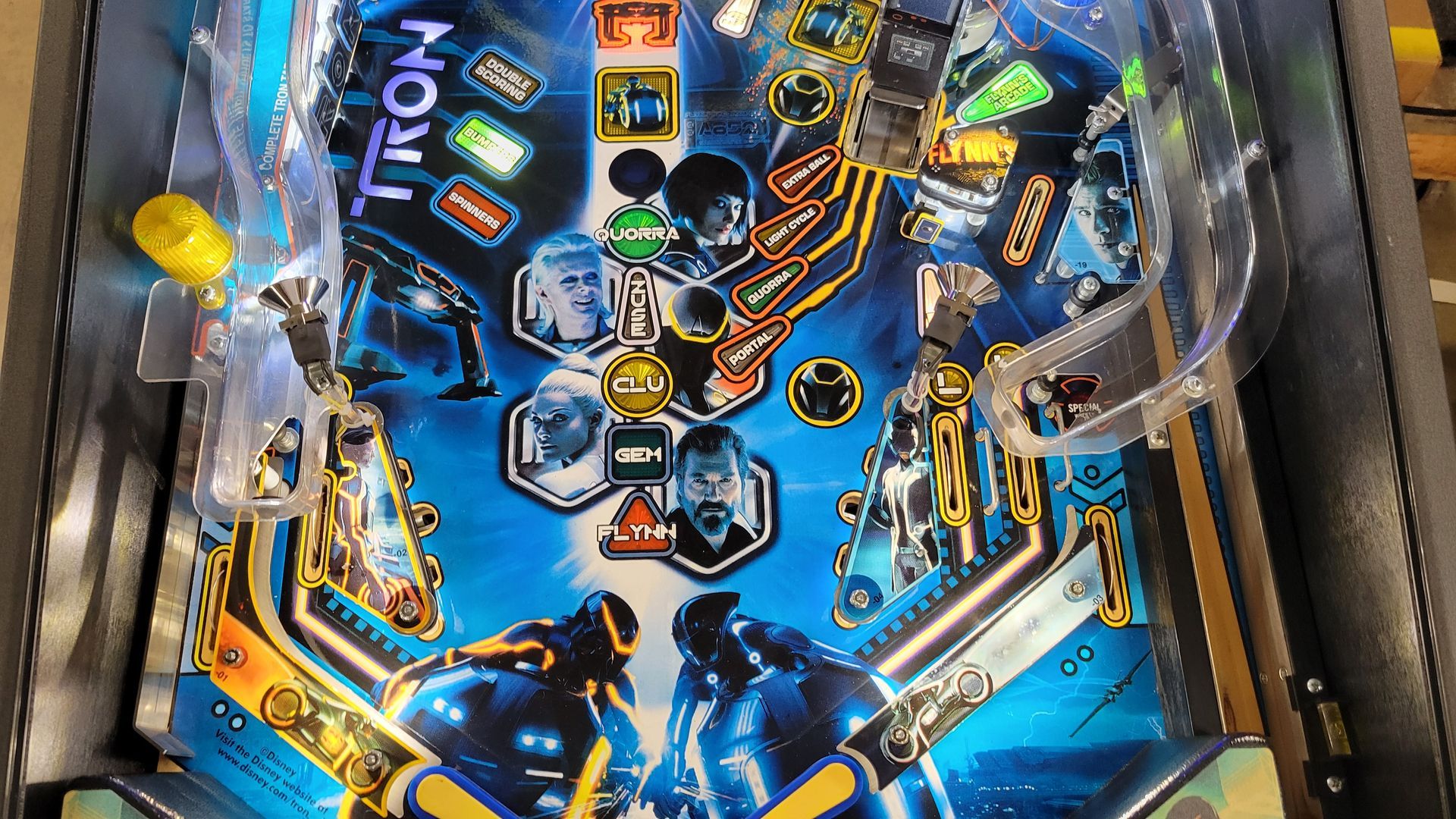 A pinball machine with the word tron on it