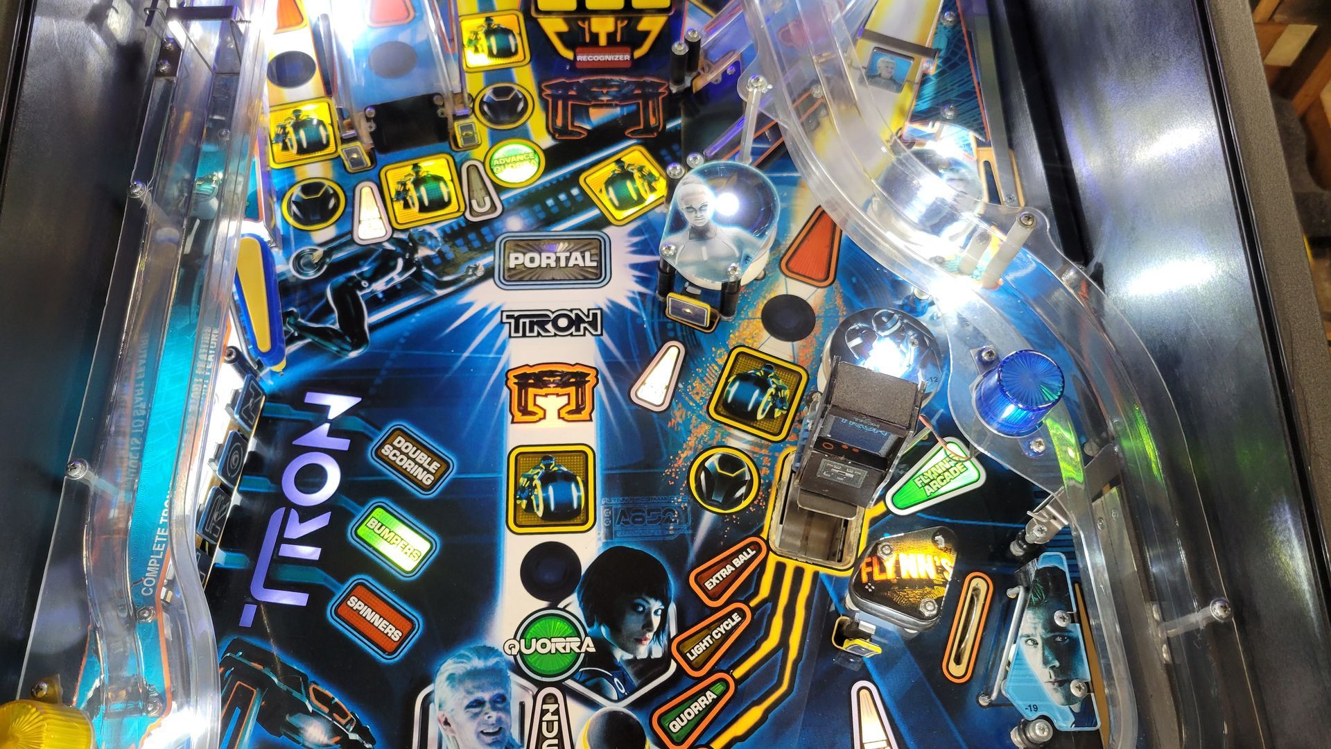 A pinball machine with the word tron on it