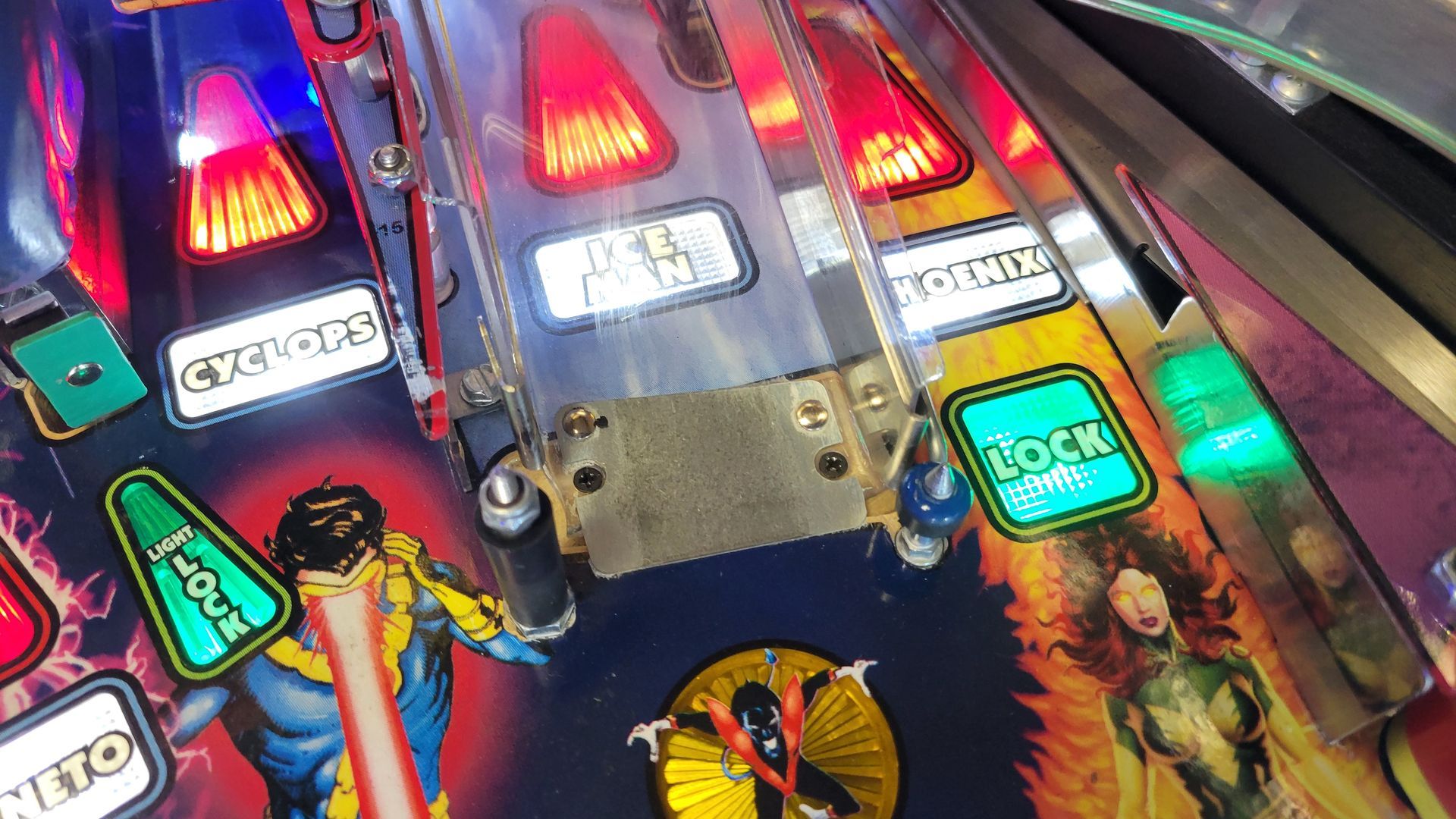 A pinball machine with a picture of a man and a woman on it.