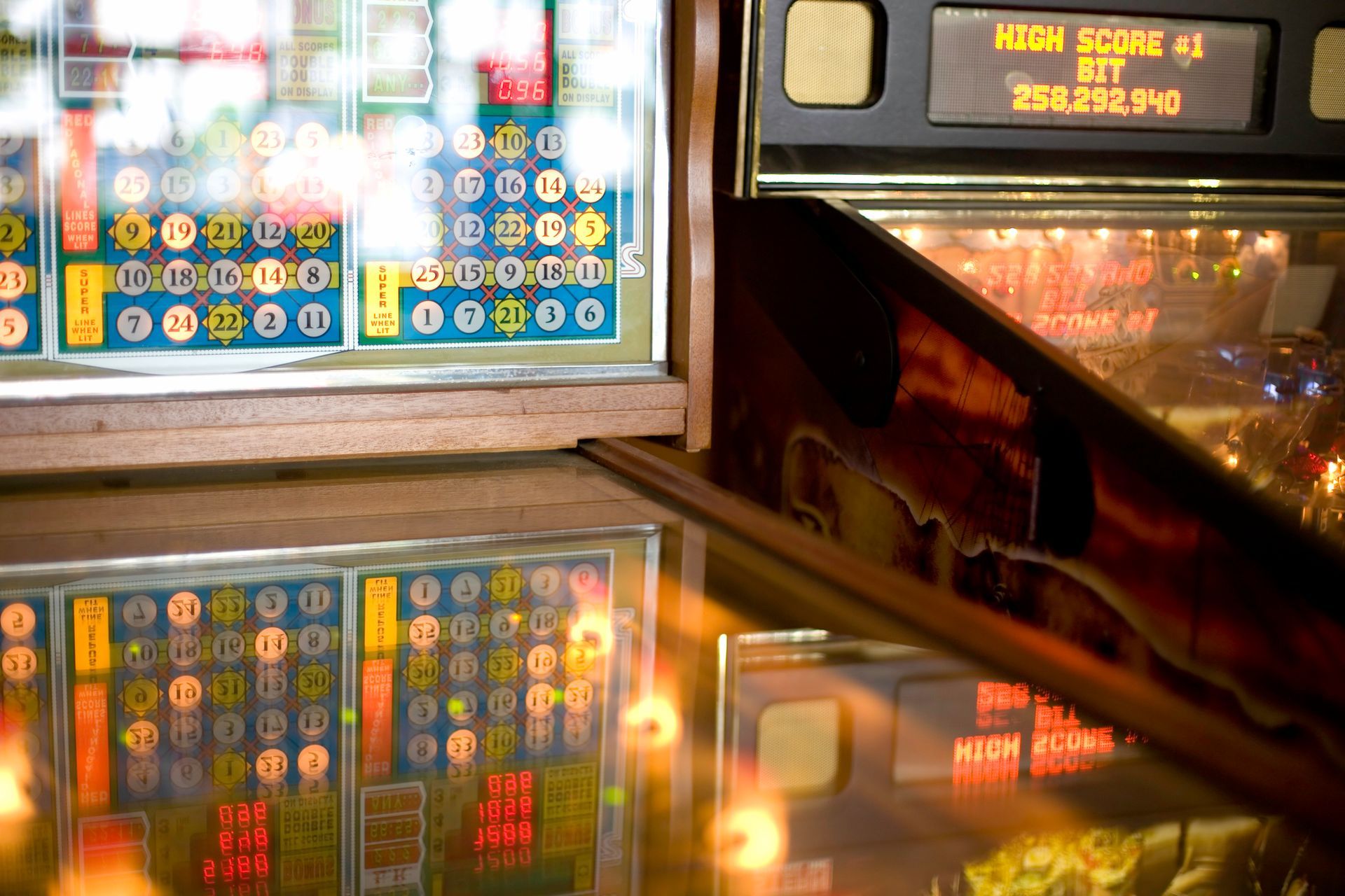 Two pinball machines in a game room, ideal for enthusiasts seeking pinball machine repair services. Two pinball machines in a game room, ideal for enthusiasts seeking pinball machine repair services.