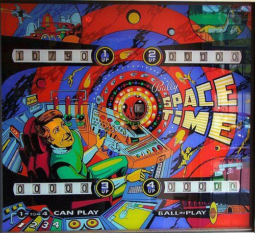 A pinball machine that says space time on it