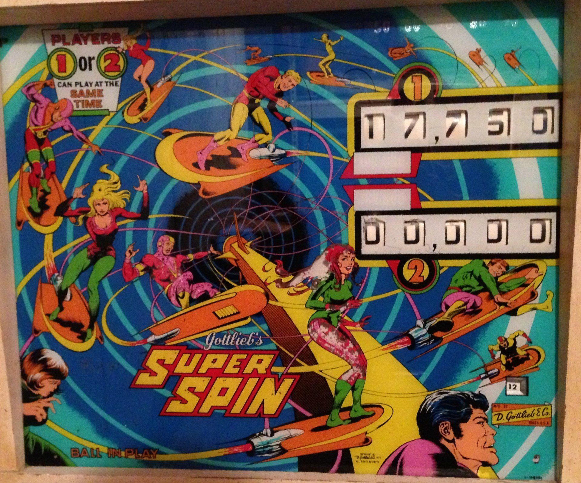 A pinball machine with super spin on the front