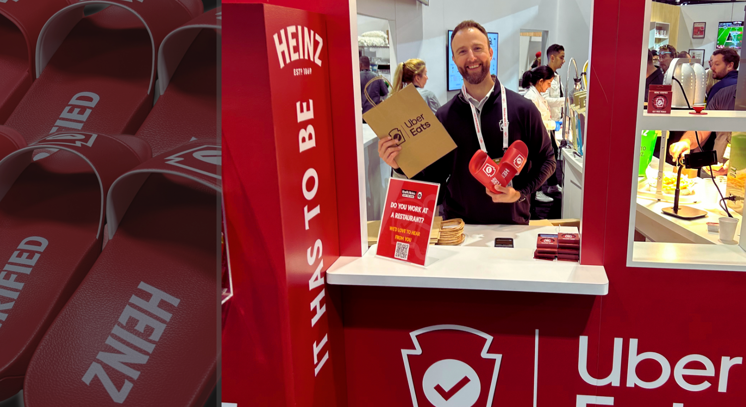 A man is standing in front of a Heinz booth holding a heart shaped box.