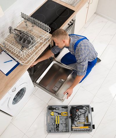 Technician Repairing the Kitchen Dishwasher | Dyer, IN | Anderson Appliance Repair
