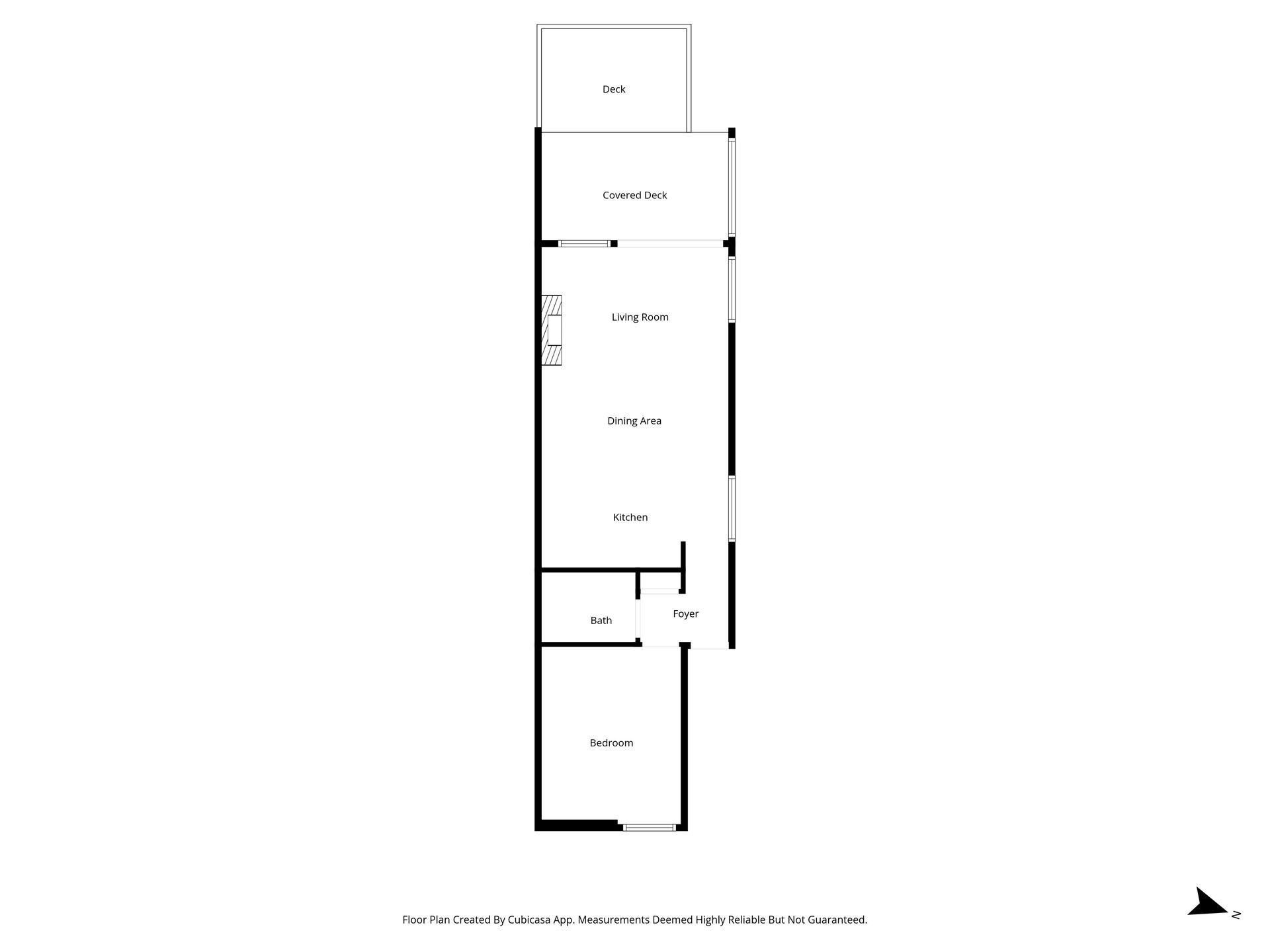 A black-and-white floor plan of a rectangular apartment layout with a kitchen, living area, bathroom, and bedroom.