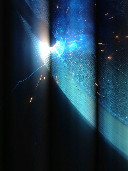 A close up of a person welding a piece of metal — Line Boring in Chevallum, QLD