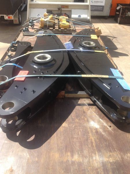 A pair of black boats sitting on top of a wooden table — Line Boring in Chevallum, QLD