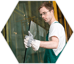 Man Holding a Glass — Glass Specialist in Port Macquarie, NSW