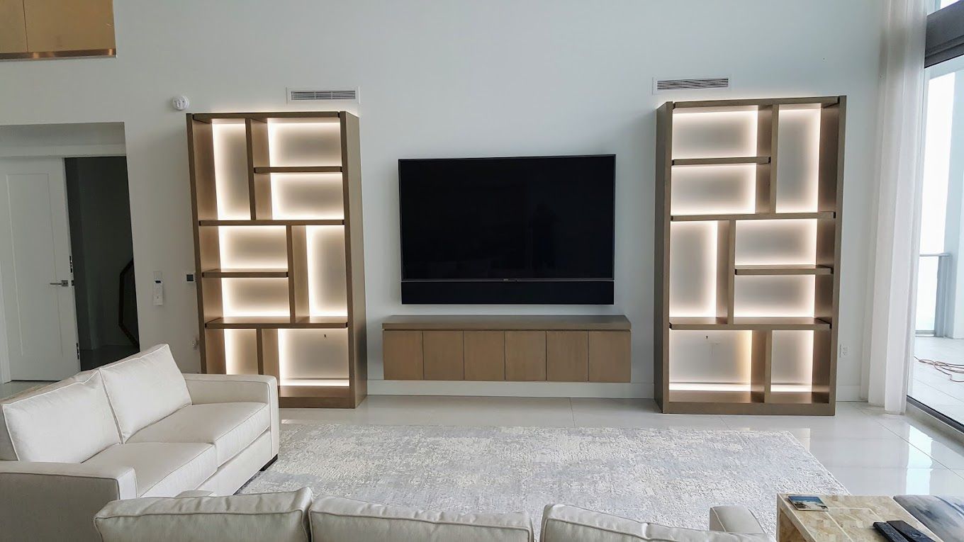 A living room with a couch and a flat screen tv
