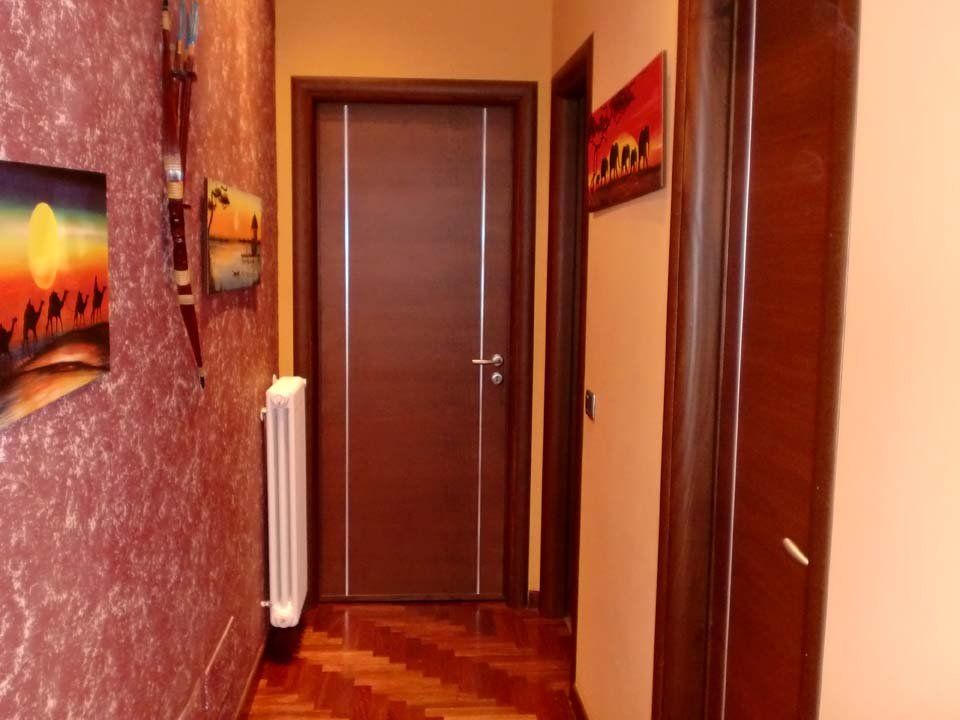 Porta in fondo a corridoio