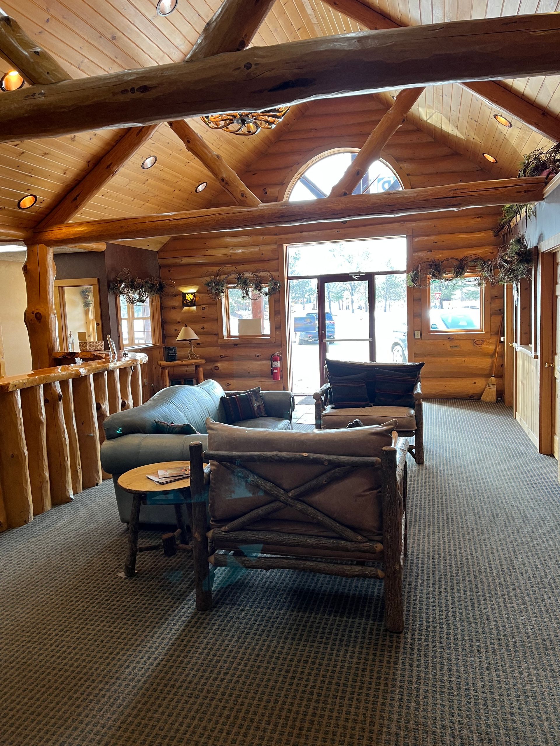 A woman is getting her ears examined by a doctor