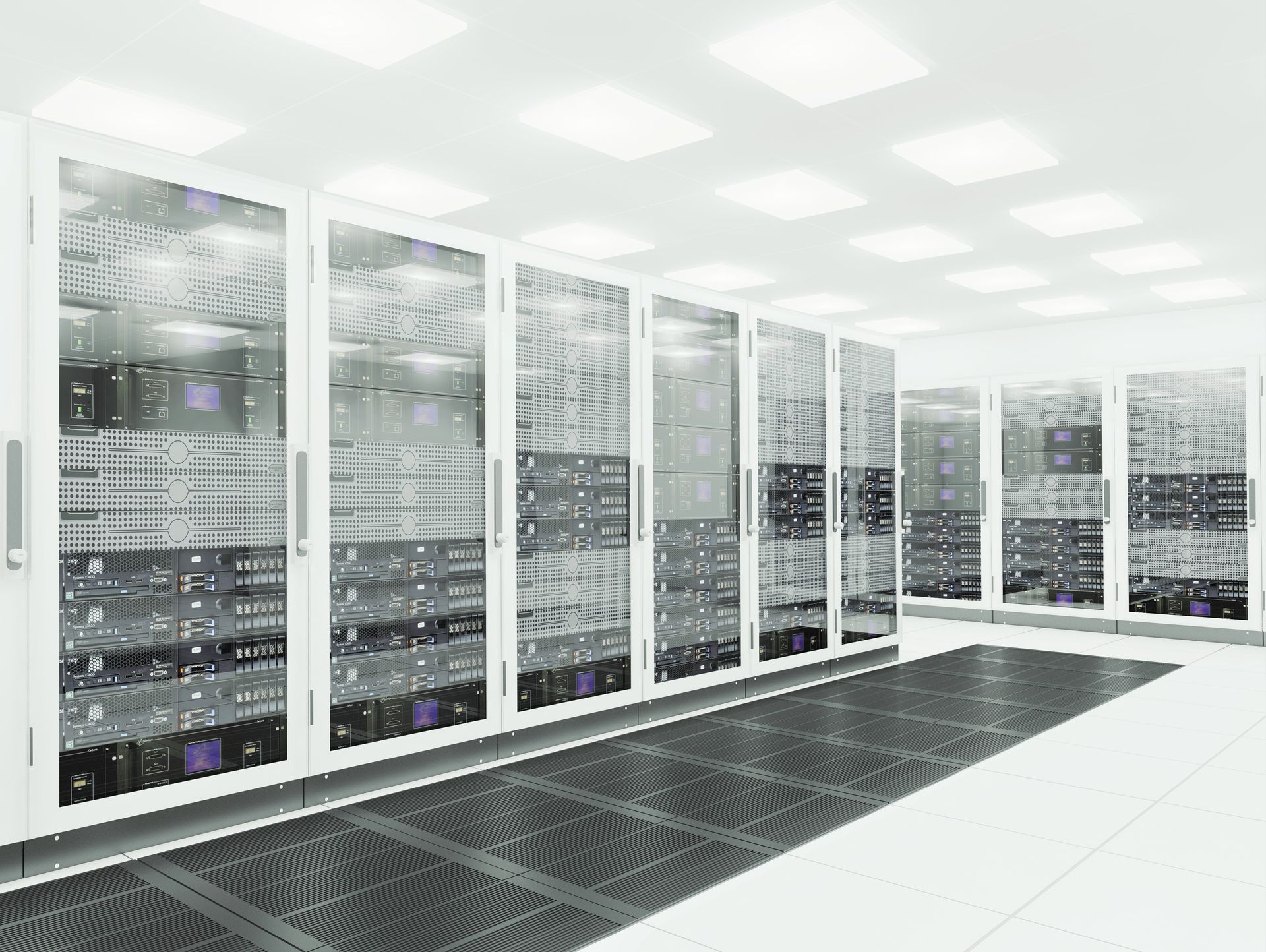 Rows of server racks in a brightly lit data center.