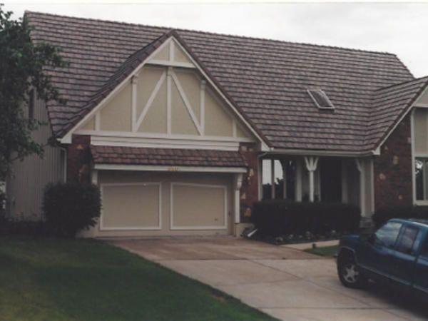 A House With A Car Parked in Front — Kansas City, KS — All American Roofing