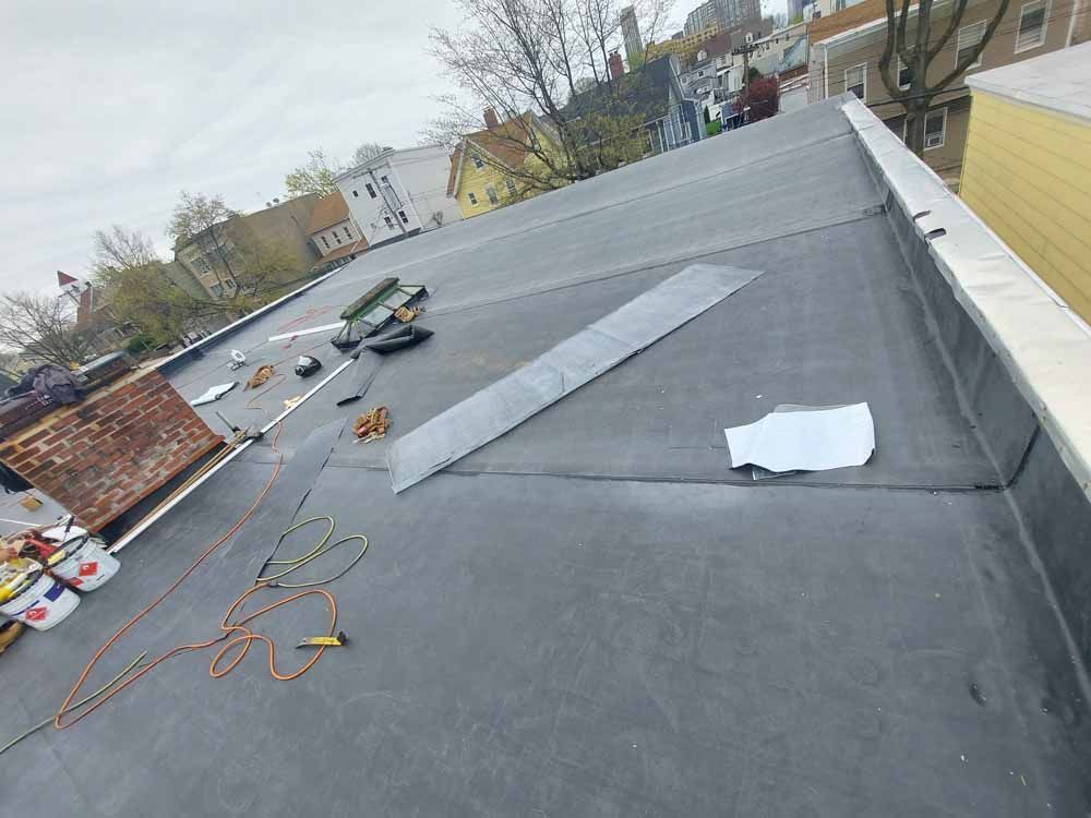 A flat roof is being installed on a building.