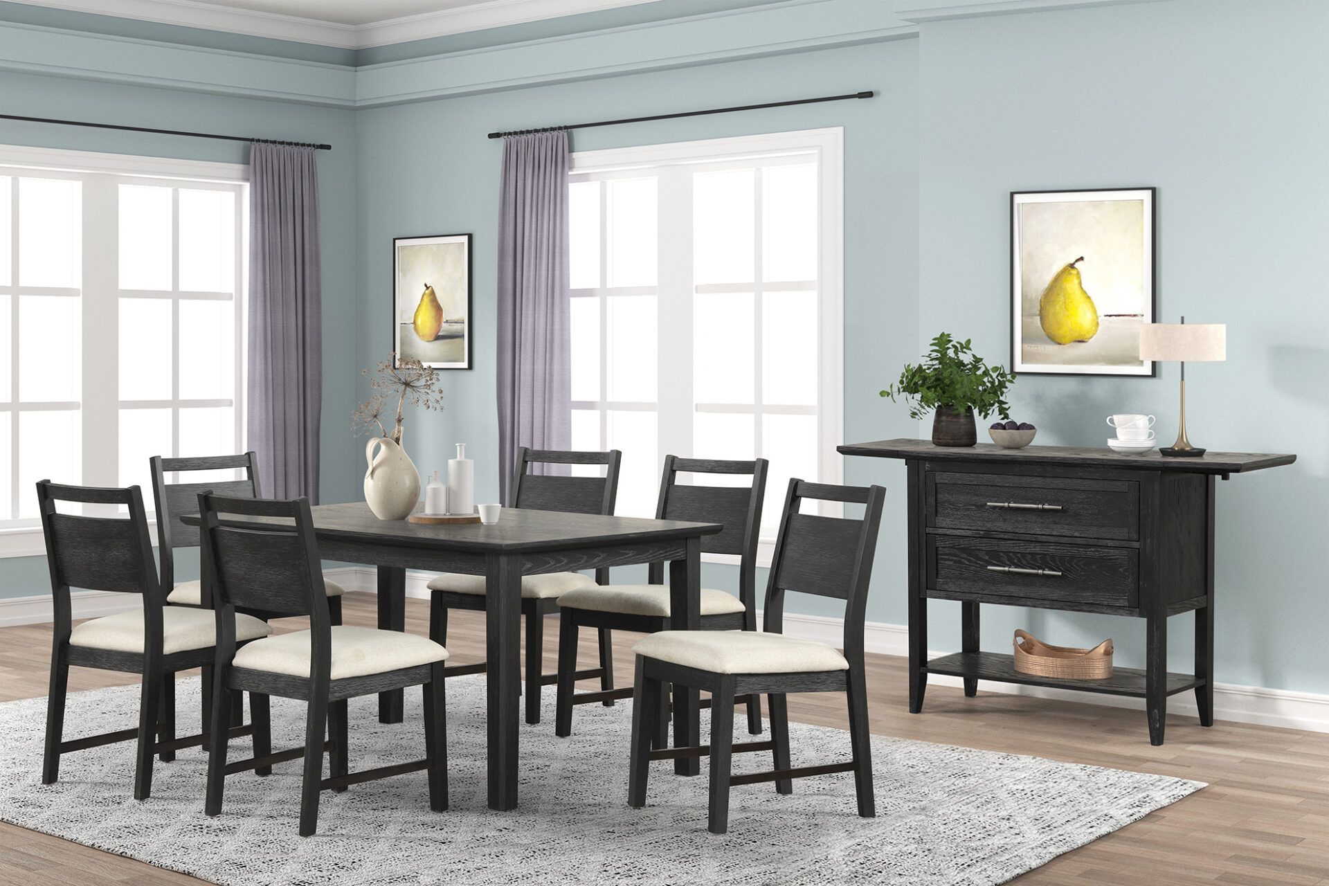 Dining room with black table and chairs, gray walls, and a black sideboard beneath bright windows.