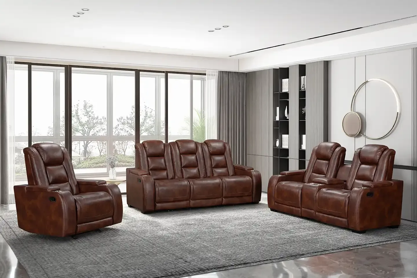 Brown leather sofa set in a bright modern living room with large windows and a gray rug