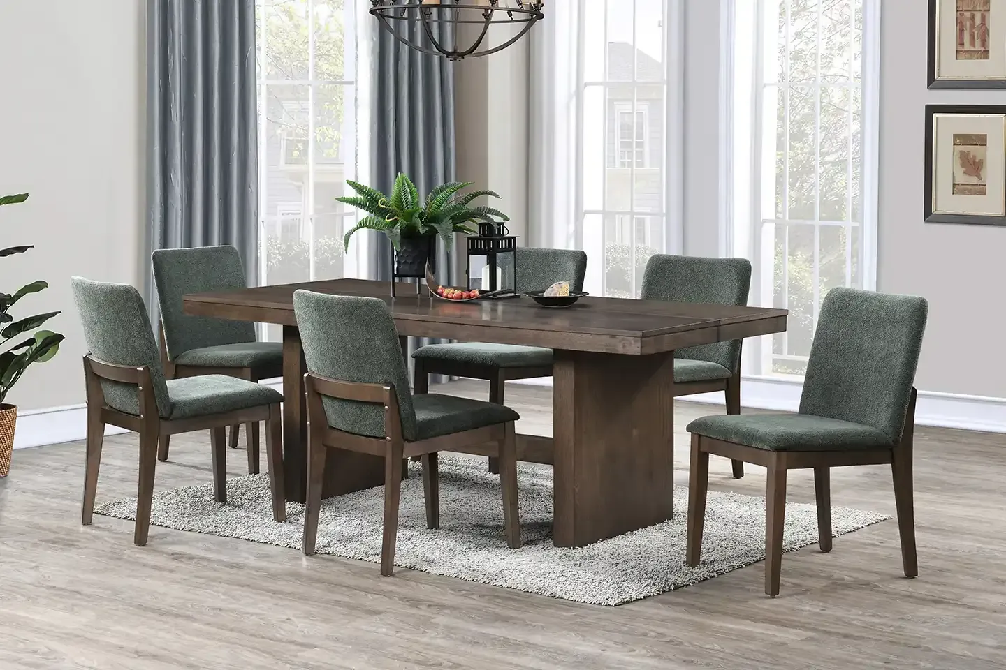 Dining room with dark wood table, six green upholstered chairs, and a striped rug by tall windows