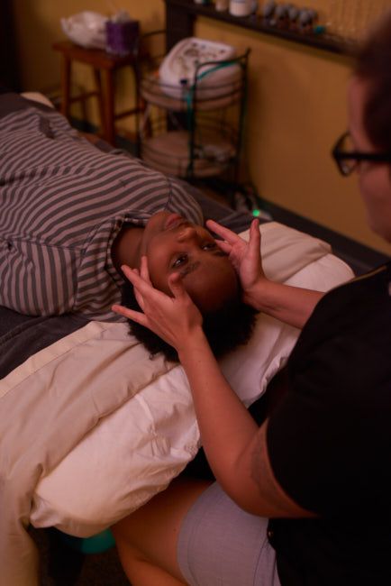 a man is receiving a massage treatment 