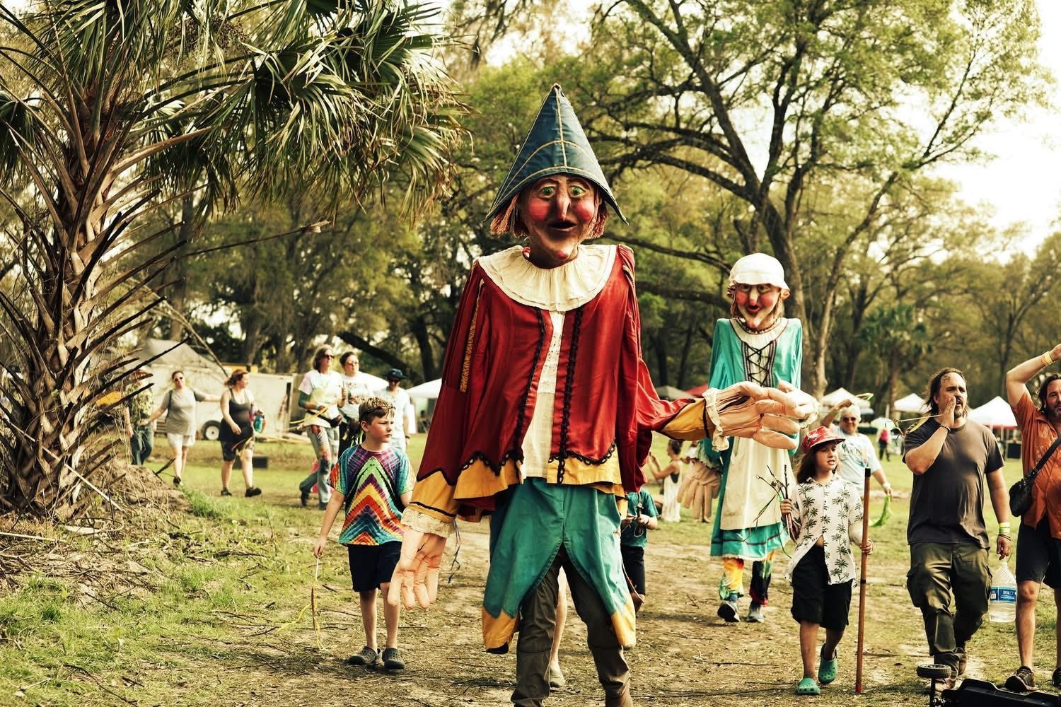Music festival puppets and parade.