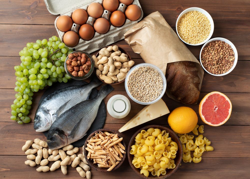 Various Food Ingredients layed out on a table.