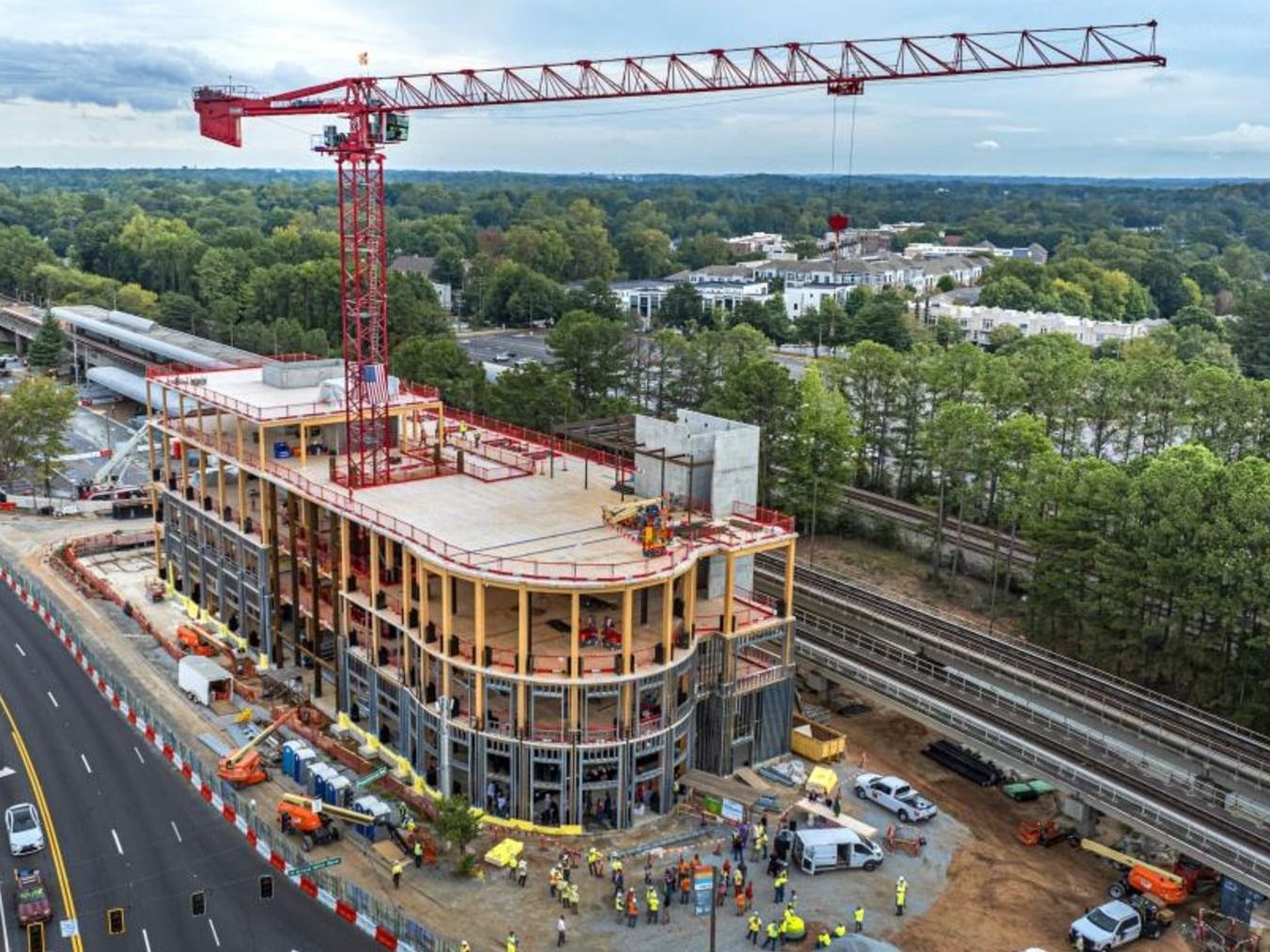 An aerial view of a large building under construction.