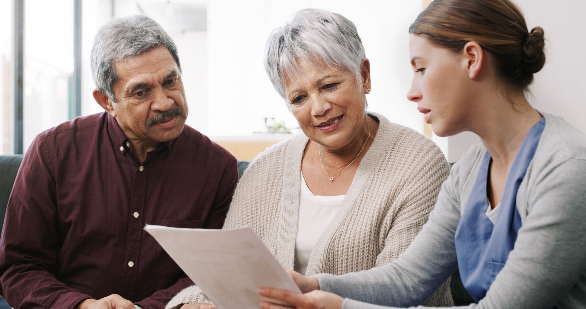 Senior Couple Talking with Woman — Bristol, TN — Nicewander & Associates