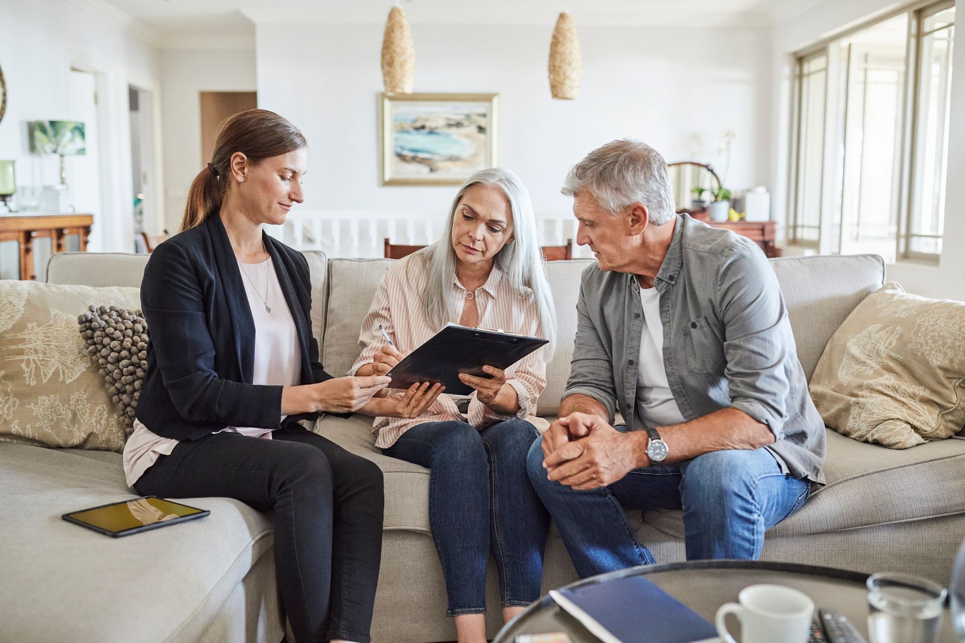 Woman Talking to A Man and Woman — Bristol, TN — Nicewander & Associates