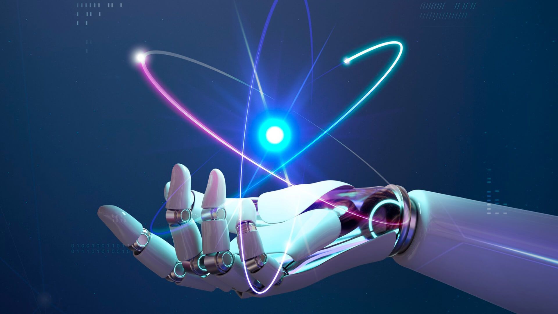 A robotic hand is holding an atom in its hand.